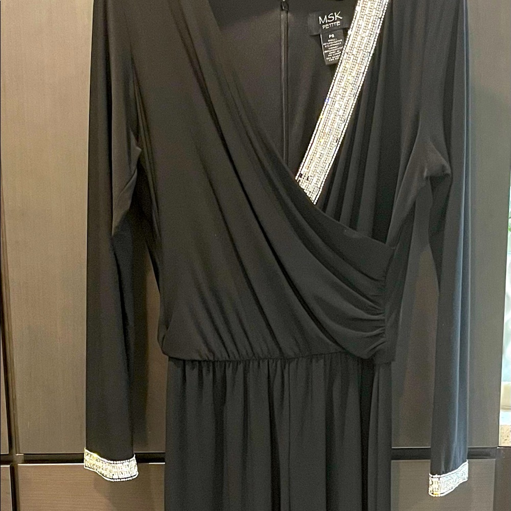 Black jumpsuit with rhinestone beaded detail trim!